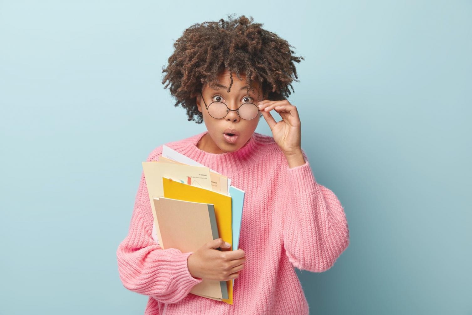 Financial planning workspace with budget spreadsheet and coffee